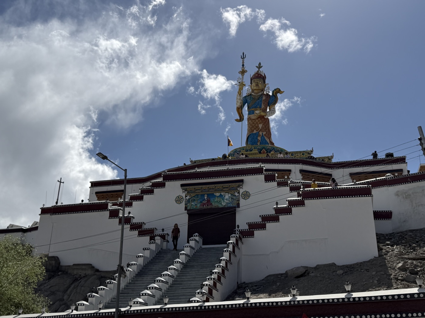 Diskit Monastery in Nubra Valley, dominated by the towering Maitreya Buddha statue standing above the monastery facade